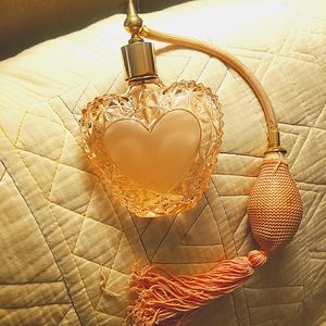 Vintage heart-shaped atomizer perfume bottle